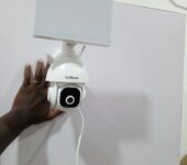 Wireless security camera with floodlight