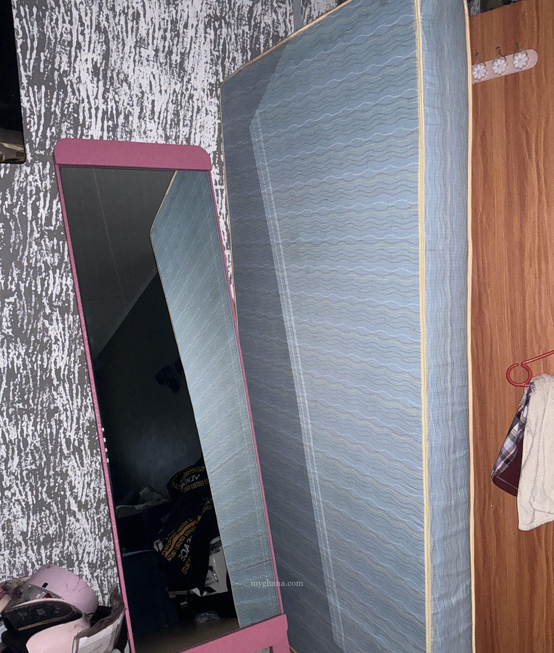 Bed and mirror